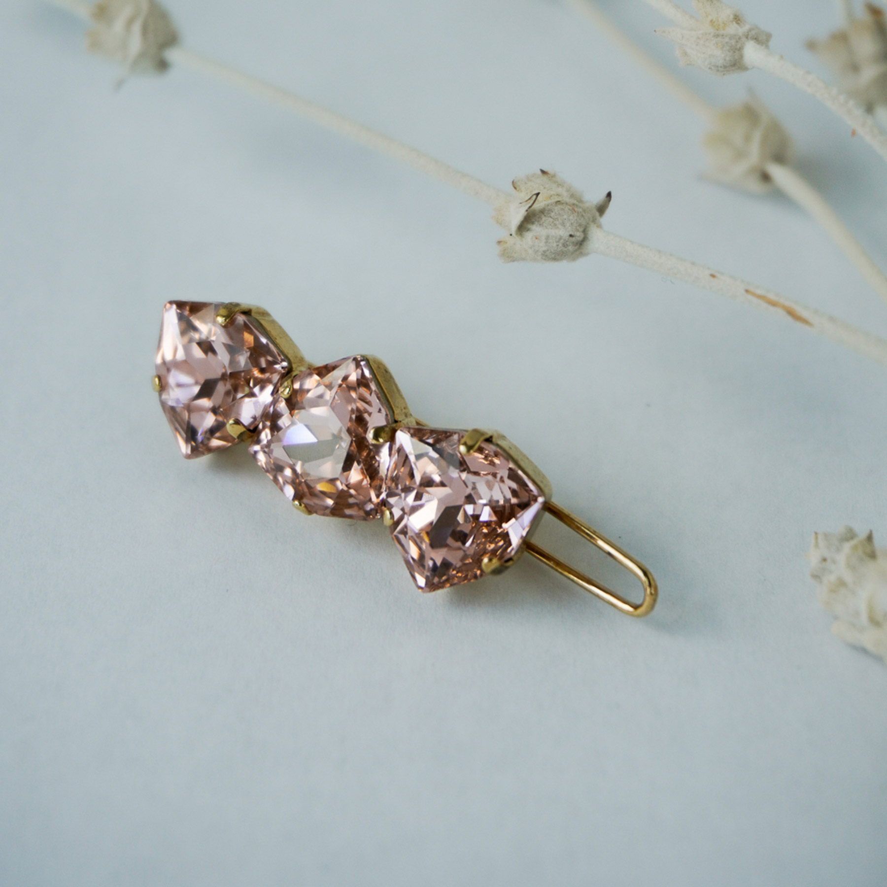 Haarspange mit Steinen in Gold bei andcosy bestellen